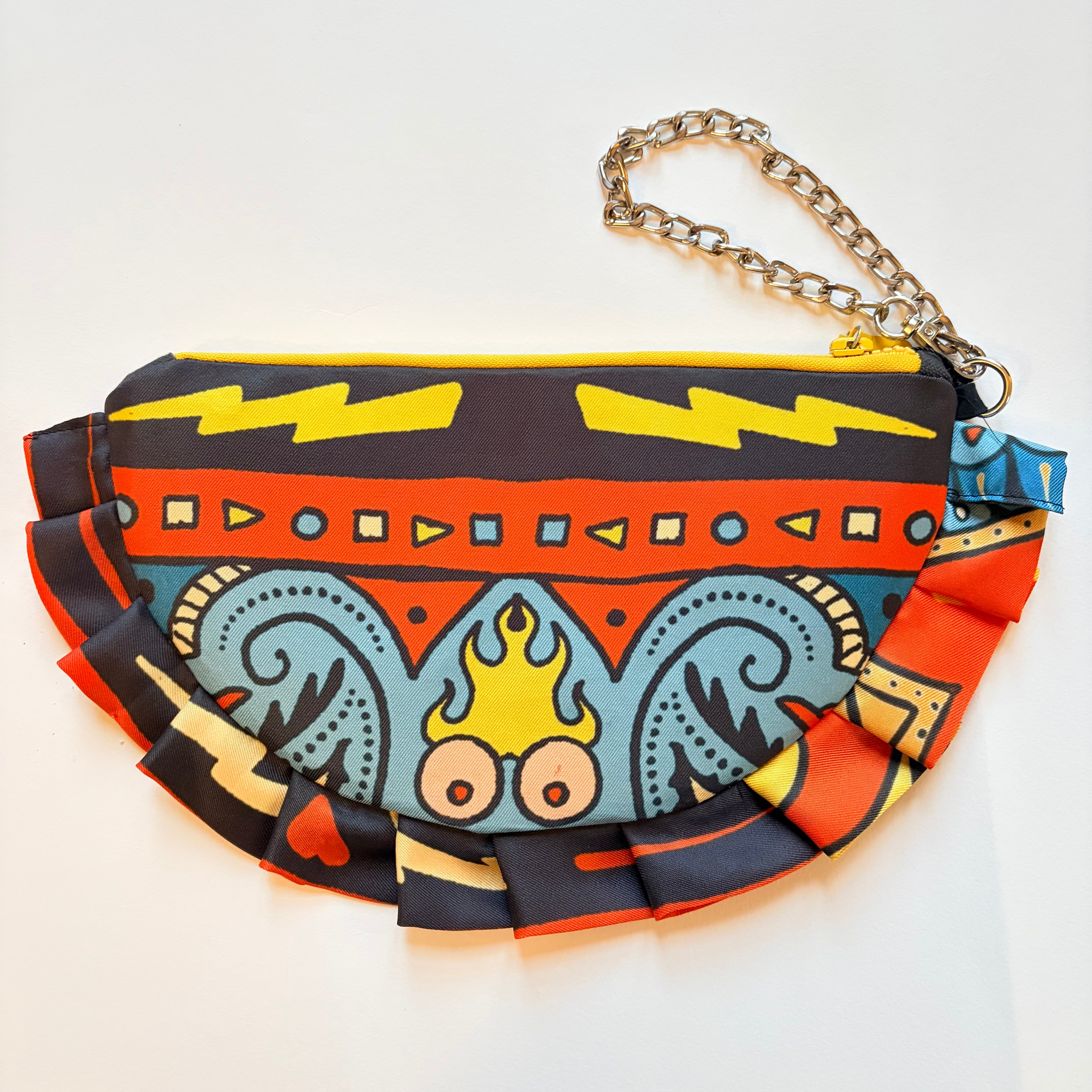 pochette borsa con tette con fiamme